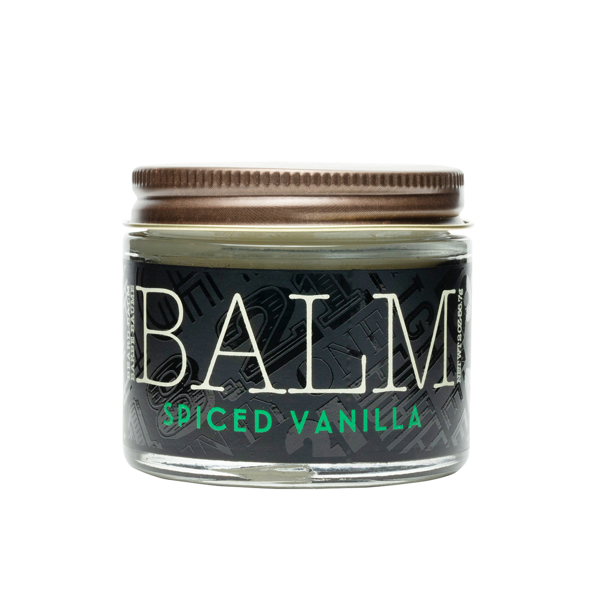 Jar of balm labeled 'Spiced Vanilla' on a white background