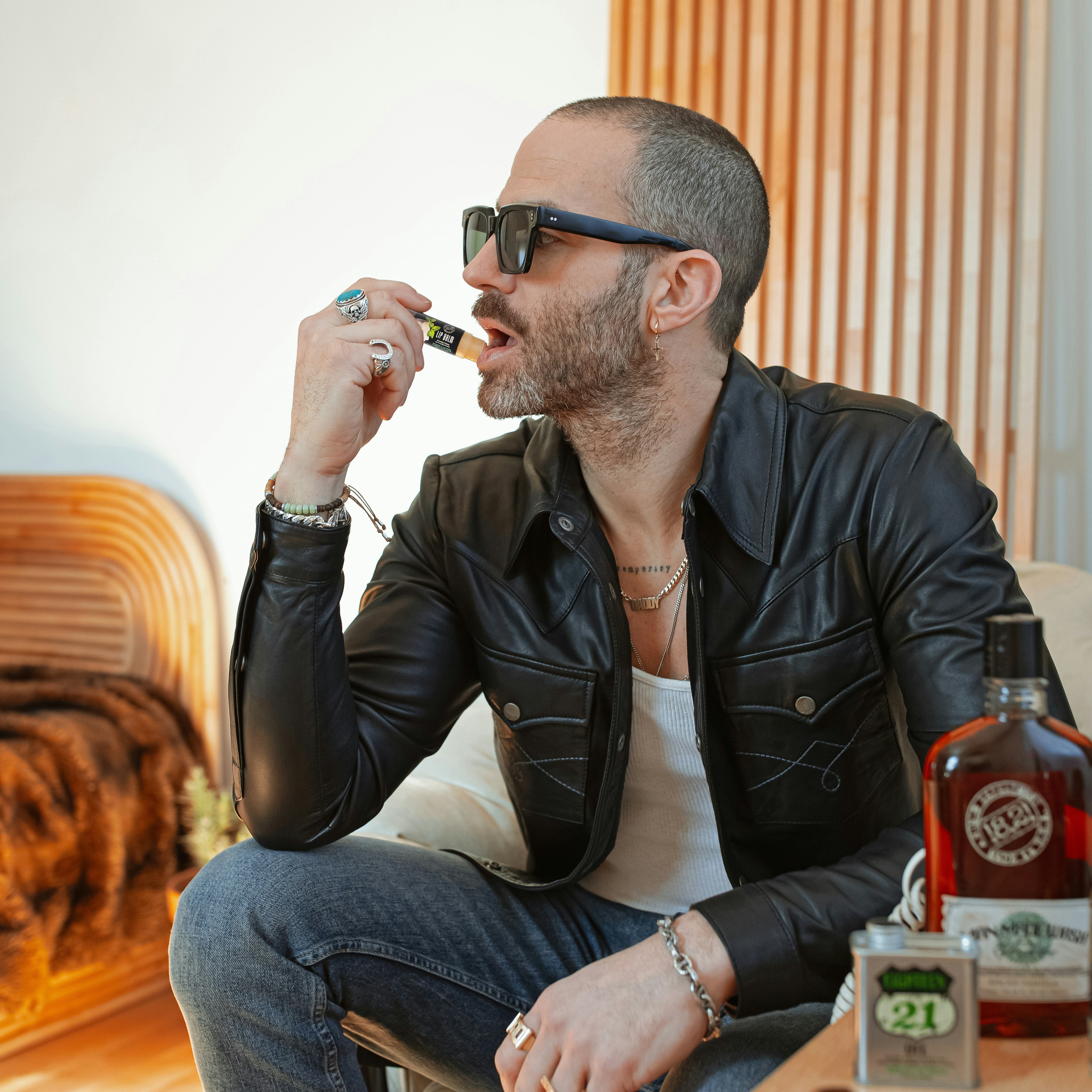 image of model applying lip balm