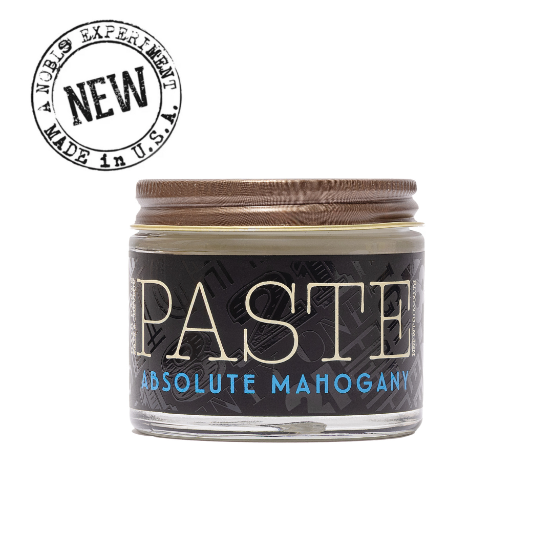 Jar of 'Paste Absolute Mahogany' with a 'NEW' label above it on a white background