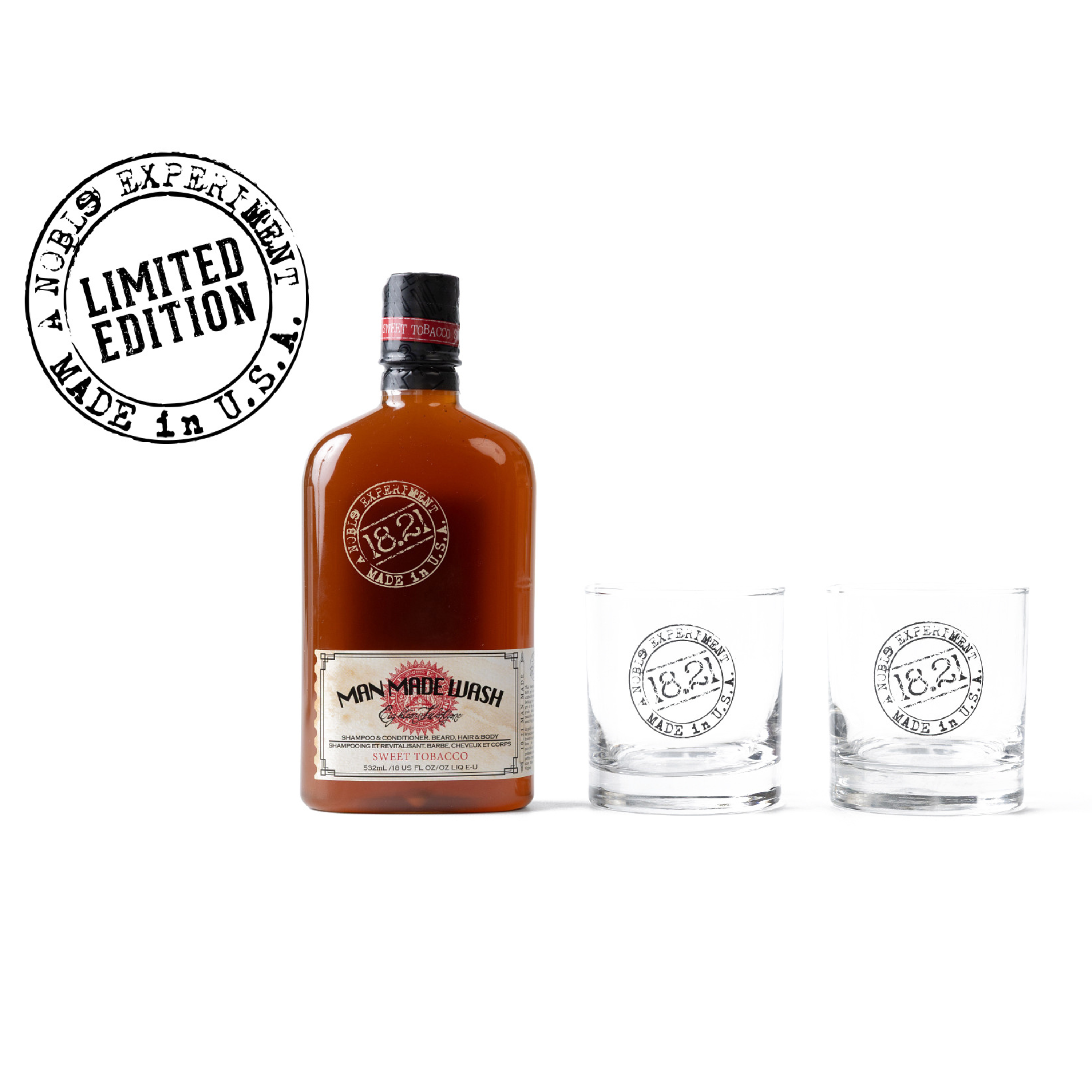 Bottle of Man Made Wash whiskey with two glasses on a white background, featuring '1823' branding.