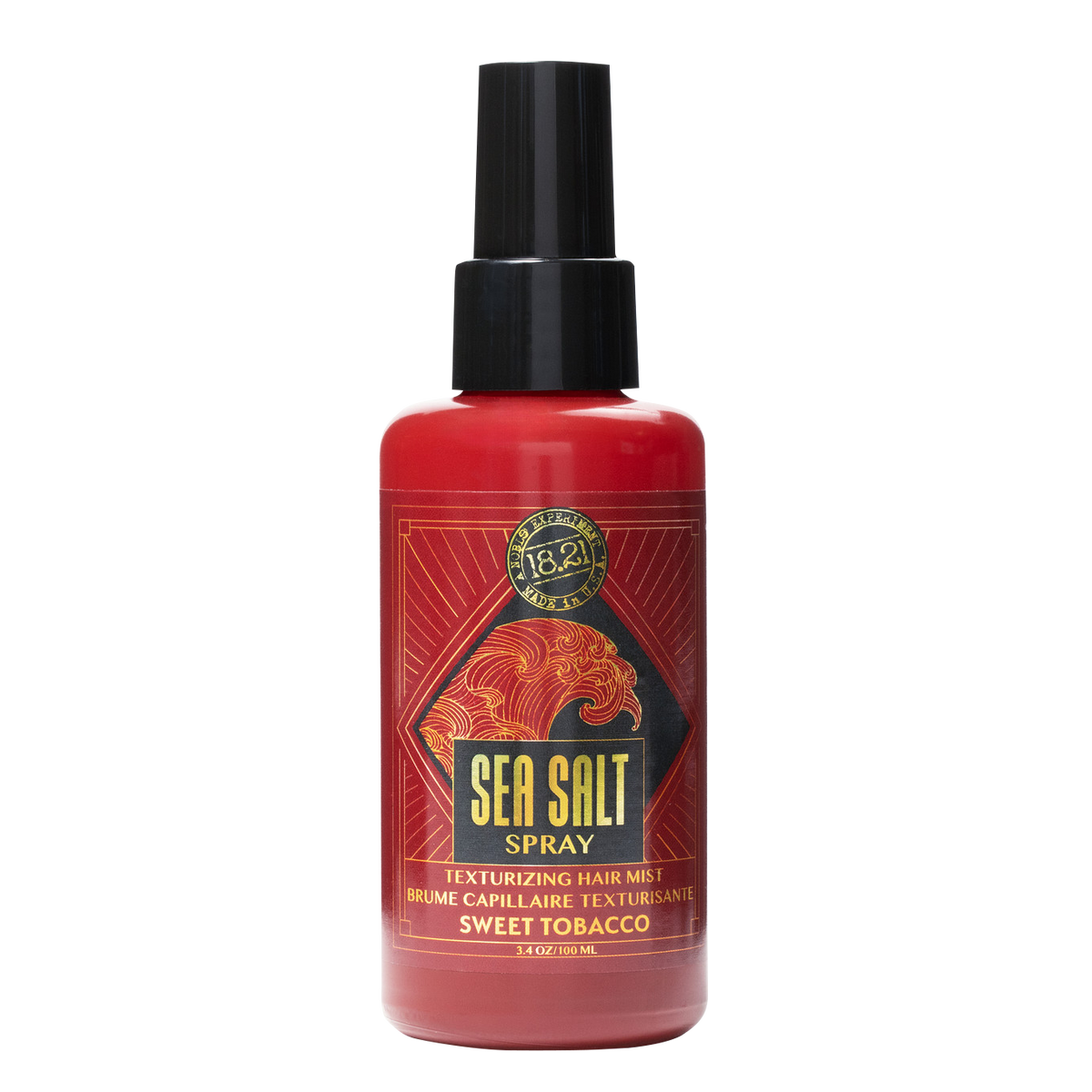 Red spray bottle labeled 'Sea Salt Spray' on a white background